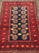 A Turkman wool rug The midnight blue fi
