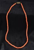 A single strand coral bead necklace