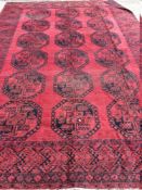 A Tekke wool carpet The wine red field