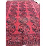 A Tekke wool carpet The wine red field