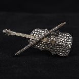 A silver marcasite set brooch