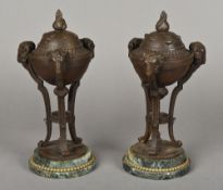 A pair of classical bronzed urns and covers Each with removable lid above the main body,