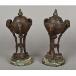 A pair of classical bronzed urns and covers Each with removable lid above the main body,