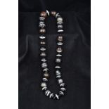 A banded agate bead necklace The beads