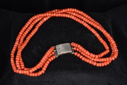 A three strand coral necklace Set with