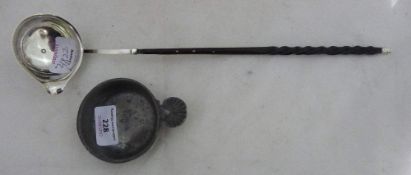 A 19th century pewter wine taster with shell grip and a silver and baleen toddy ladle