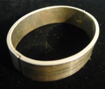 A silver Ralph Lauren hinged bracelet