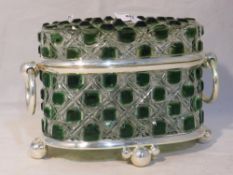 A green cut glass casket