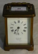 A brass cased carriage clock