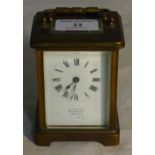 A brass cased carriage clock