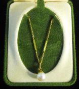 A 9 ct gold and pearl necklace
