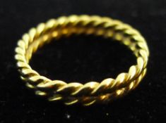 An unmarked gold band