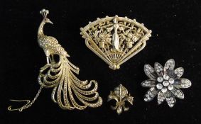 Four various brooches