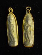 Two early Eastern pendants