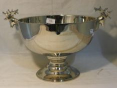 A silver plated punch bowl with stag mask handles