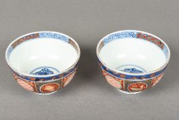 A pair of Japanese porcelain bowls Decorated in the Imari palette,