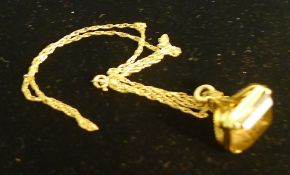 A 9 ct gold fob seal and gold chain