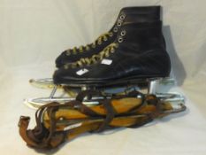 A pair of Fen runners and a pair of skates