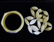 An ivory bangle and ivory necklace