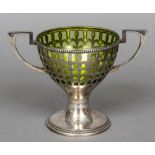 A WMF silver plated twin handled cup and green glass liner The bowl pierced. 12.5 cm high.