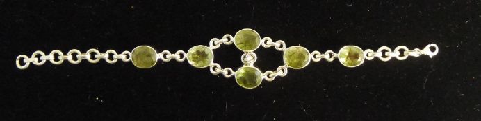 A silver peridot bracelet