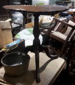 A 19th century pie crust topped mahogany tilt top tripod table