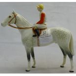 A Beswick dapple grey racehorse with jockey up