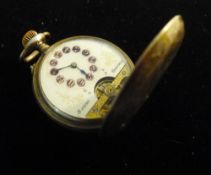 A silver eight-day open escapement pocket watch