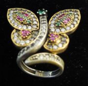 A silver and multi-stone butterfly ring