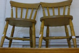 A pair of kitchen chairs