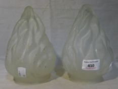 A pair of frosted glass lamp shades