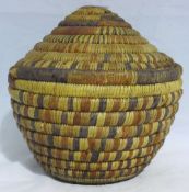 A Native American Indian woven lidded basket