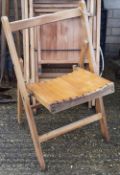Four wooden folding garden chairs