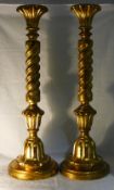 A pair of gilt decorated wooden lamp bases