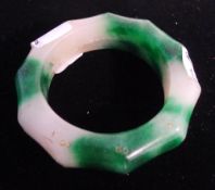 A faux bamboo jade bangle