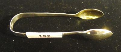 A pair of Chinese silver sugar nips