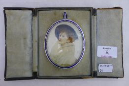 An Edwardian miniature, hand painted on ivory, depicting a young lady,