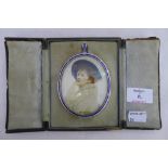 An Edwardian miniature, hand painted on ivory, depicting a young lady,