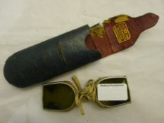 A pair of early steel framed tinted folding spectacles,