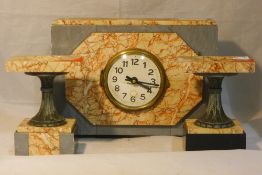 An Art Deco three piece clock set