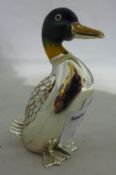 An enamel and silver duck