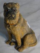 A 19th century terracotta model of a pug dog