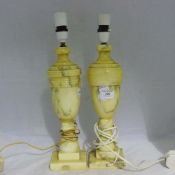 A pair of alabaster lamps