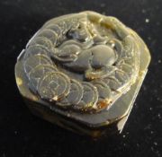 A carved jade seal