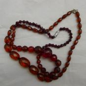 Two faceted bead necklaces,