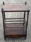 A Victorian walnut Canterbury whatnot