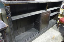 A Victorian carved oak bookcase