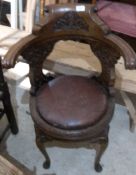 A Victorian carved oak desk chair