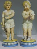 A pair of bisque porcelain figures of children