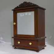 A miniature armoire